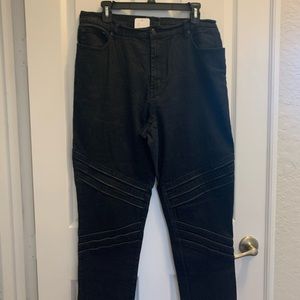 Diane Gilman black stretch jeans with zipper teeth legs.